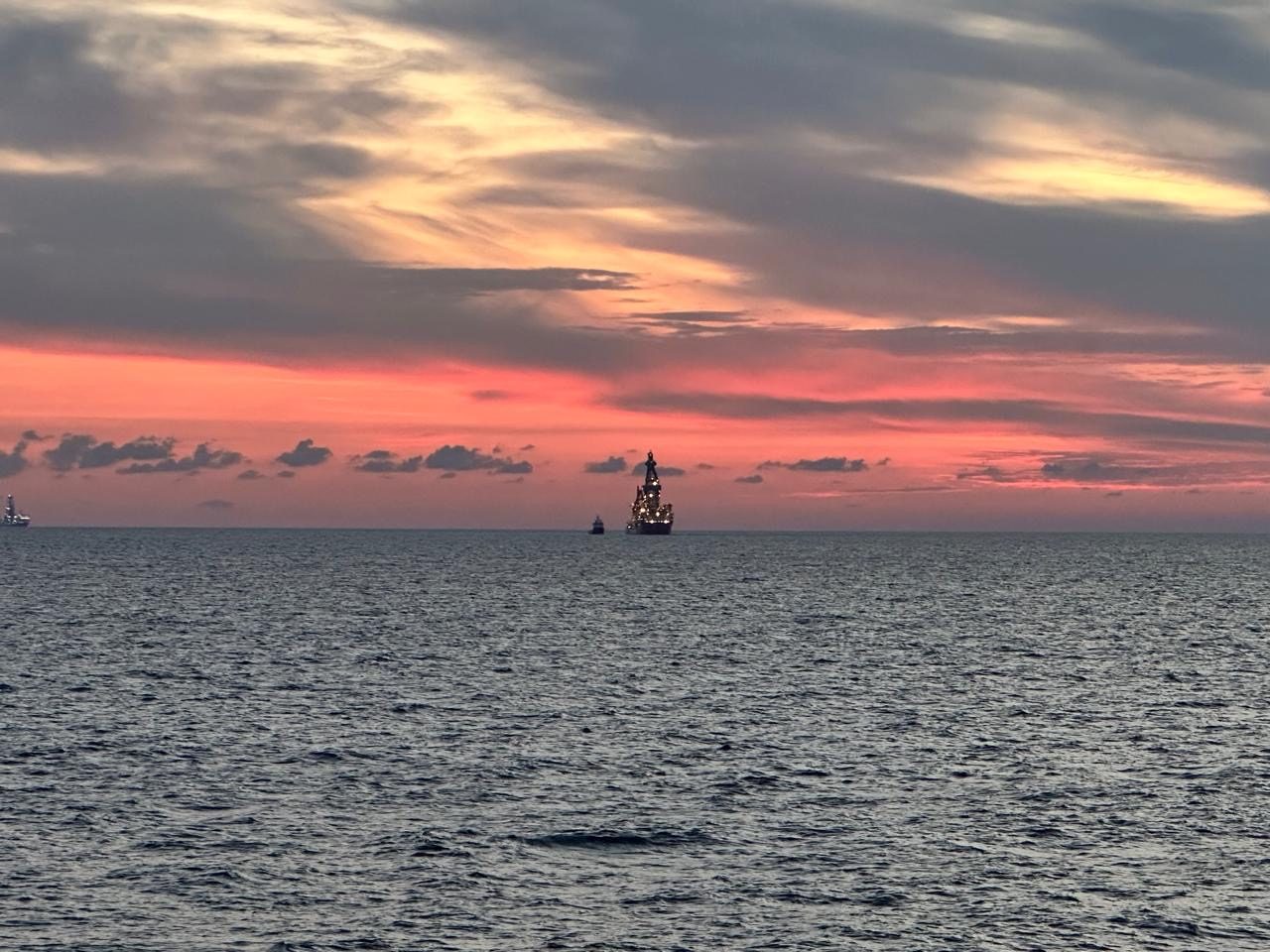 the sky going pink over the water