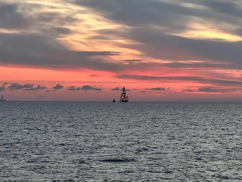the sky going pink over the water